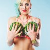 stock-photo-34865800-melons-infront-of-breast.jpg